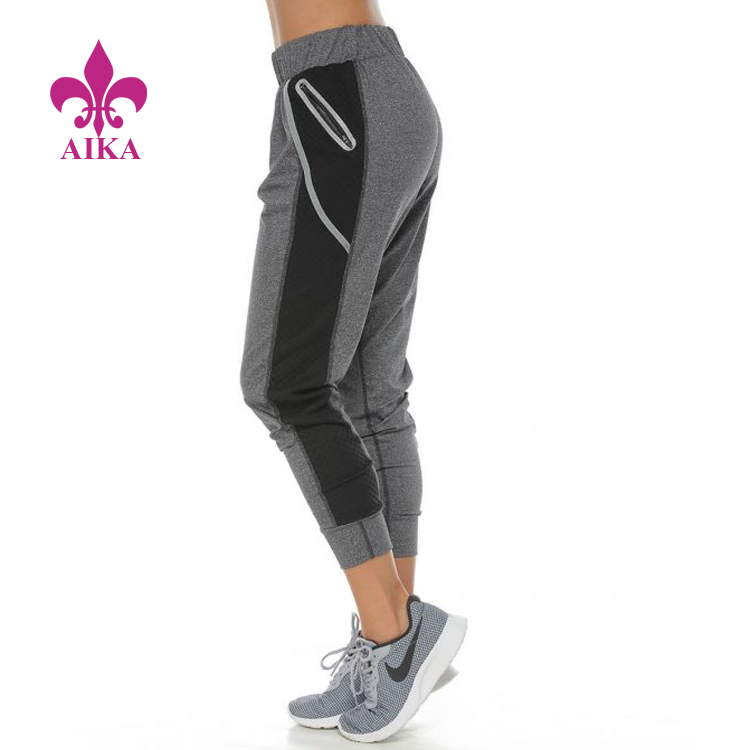 Tukkumyynti hyvälaatuisia kontrastivärisiä 3/4-pituisia taskuja vetoketjulla fitness-urheiluhousut naisten lenkkeilijät