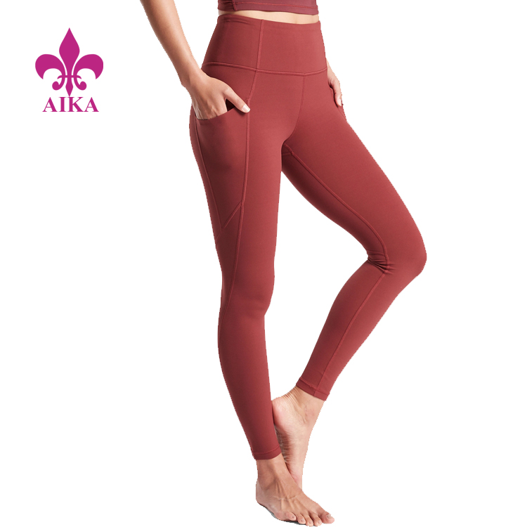 Hoë middellyf gedrukte logo-ontwerp dames leggings vroue joga broek met sakke
