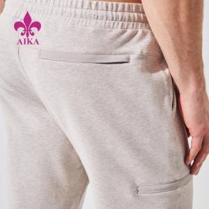 Κορυφαία πώληση OEM εργοστασιακή τιμή Cotton Polyester Slim Leg Cool Down Sweat Pant for Men Sportswear