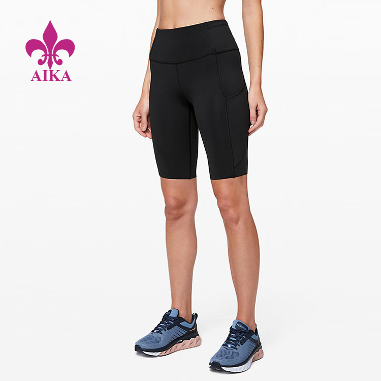 Veľkoobchodné kompresné pančuchové nohavice športového oblečenia na jogu. Nereflexné bezplatné dámske bežecké šortky