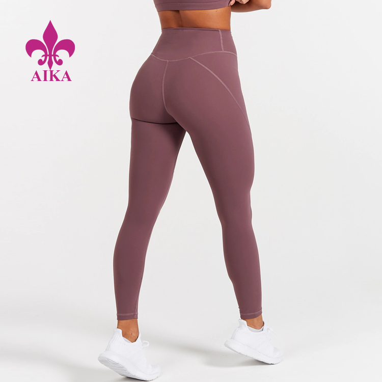 Malles de moda de cintura alta de niló Spandex Disseny de roba de fitness per a ioga Malles esportives de dona
