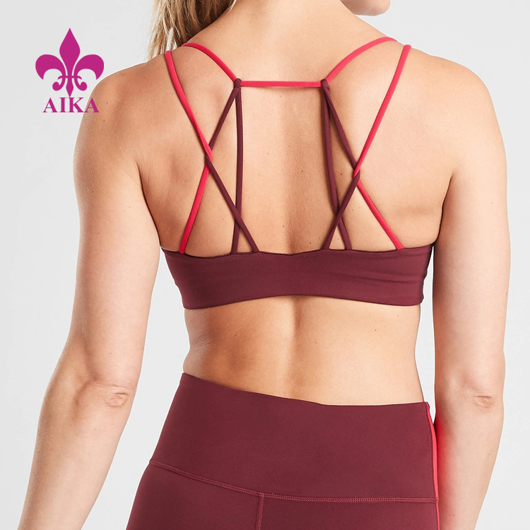 Fashion Ryg Design Polyester Spandex Dame Yoga Wear Custom Cross Strap Sports BH til kvinder