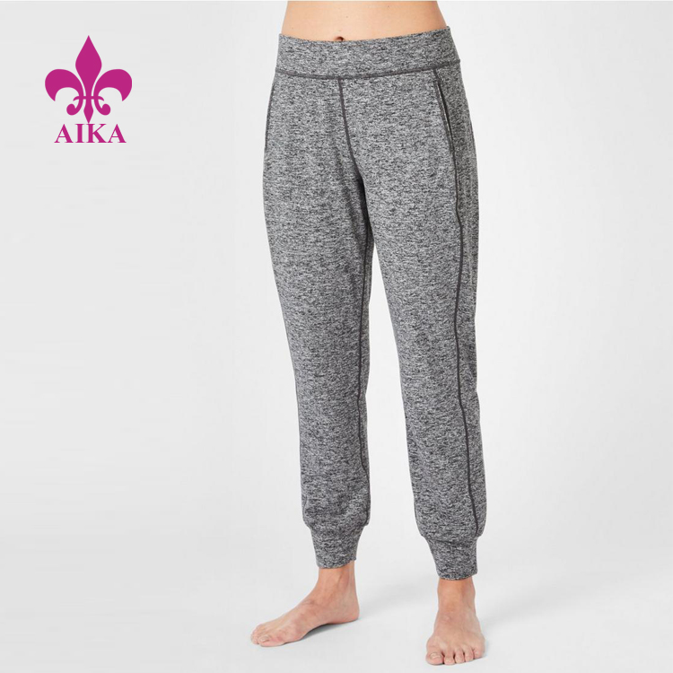 Venda a l'engròs barata d'estil bàsic personalitzat i còmodes pantalons de ioga suaus per a dones que absorbeixen la suor