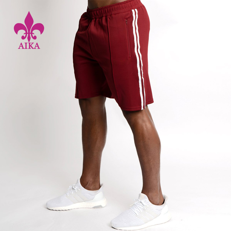 Celana pendek olahraga olahraga pria tahan keringat katun berkualitas tinggi dengan garis samping