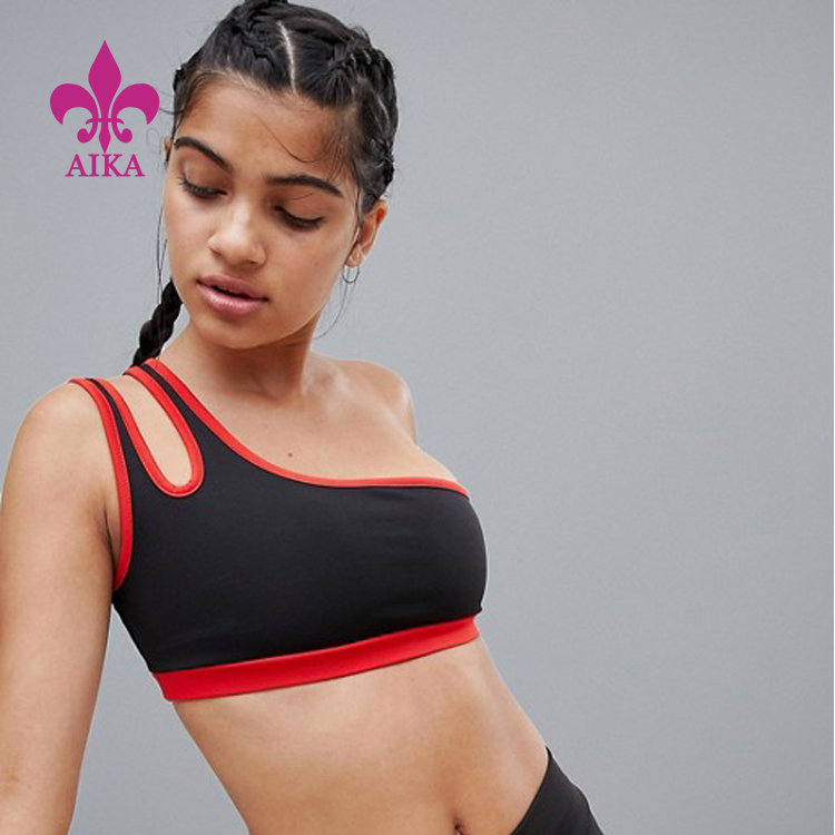 Veľkoobchodný OEM nový dizajn Očarujúca štýlová dámska športová joga podprsenka na jedno rameno