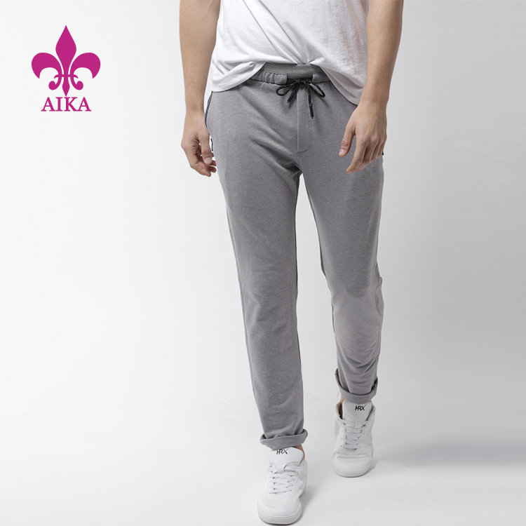 Pantallona sportive elastike për meshkuj me kordon bosh të rastësishme të lirshme OEM me shumicë me cilësi të lartë