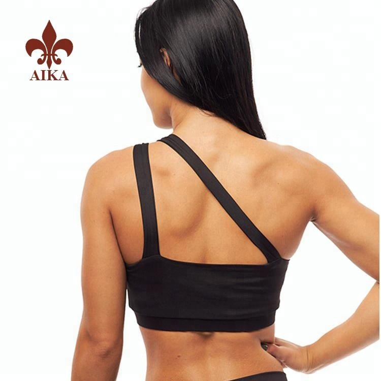 Сексуальний чорний жіночий спортивний бюстгальтер з одним плечовим ременем високої якості оптом