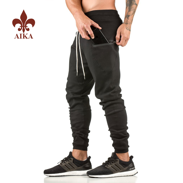 Gorąca wyprzedaż spodni w dużych rozmiarach - gorąca sprzedaż na zamówienie Bezszwowy, samoprzylepny zamek błyskawiczny Zaprojektowane męskie czarne, ołówkowe spodnie jogger z spandexu – AIKA