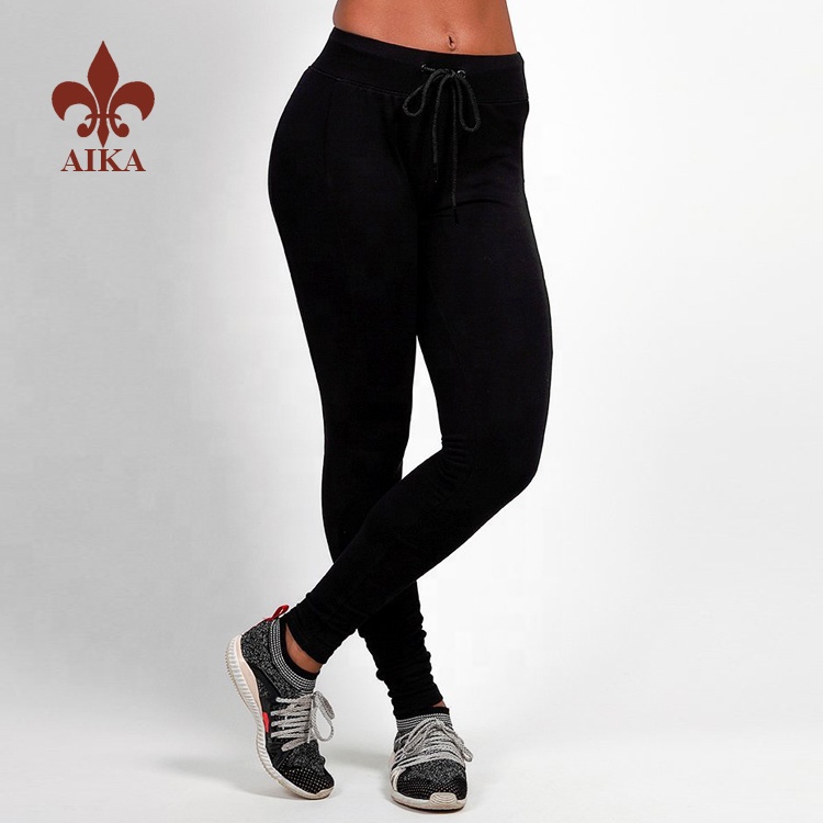 Aukštos kokybės Individualizuotos paprastos, tuščio stiliaus moteriškos treniruotės bėgimo fitneso juodos siauros sportinės kelnės
