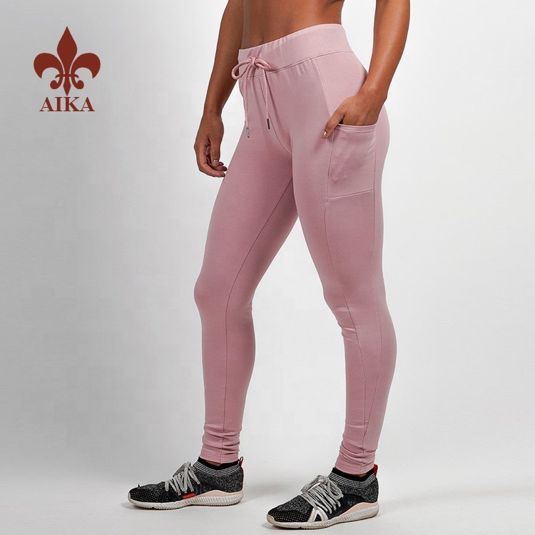 Nou estil de pantalons de pista esportius d'alta qualitat OEM personalitzats ajustats per a dona