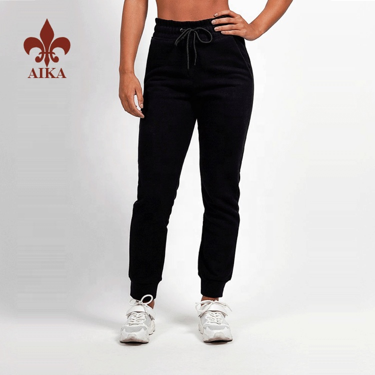 Pantalóns jogger de carga de ximnasia de fitness negros personalizados de fábrica OEM para mulleres