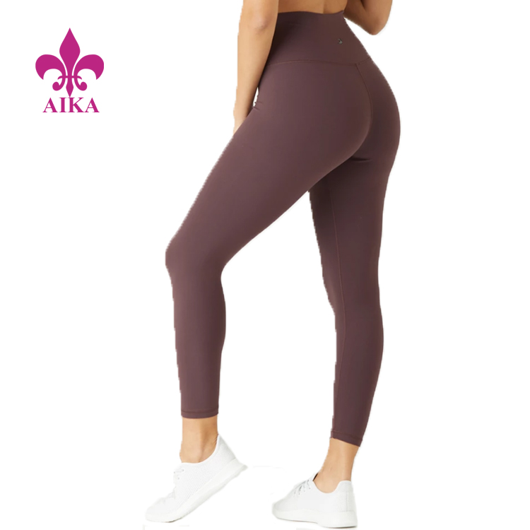 Venda a l'engròs de fabricació de malles de gimnàs de 7/8 de disseny de malles de fitness que porten pantalons de ioga de dona
