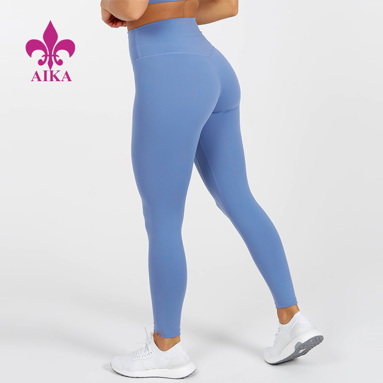 Pantalóns deportivos para mulleres Leggings de tecido transpirable Pantalóns de ioga de fitness para mulleres