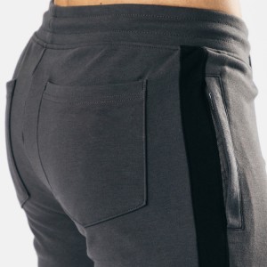 Los hombres personalizados rayados laterales de cuatro vías al por mayor de los pantalones de chándal de Spandex adelgazan a los basculadores