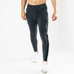Чоловічі приталені спортивні штани оптом зі спандексом у бічні смужки