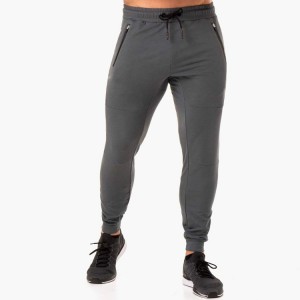 Esports de fitness Roba de gimnàs atlètica d'alta qualitat Venda a l'engròs Slim Fit Butxaques amb cremallera Pantalons jogger per a homes
