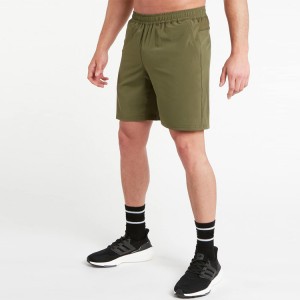 Venda a l'engròs Pantalons curts atlètics de gimnàs per a homes amb panell de malla de cintura elàstica que absorbeixen la suor amb butxaca amb cremallera