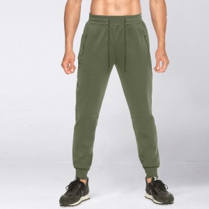 Pantaloni da jogging sportivi in ​​poliestere di cotone personalizzato di vendita calda con tasche con cerniera per uomo