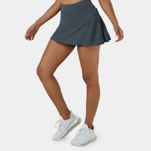 Çmimi me shumicë me porosi Shtrirje me rreshtim Pantallona të shkurtra me xhep prapa për femra Pantallona të gjera tenisi me plisa