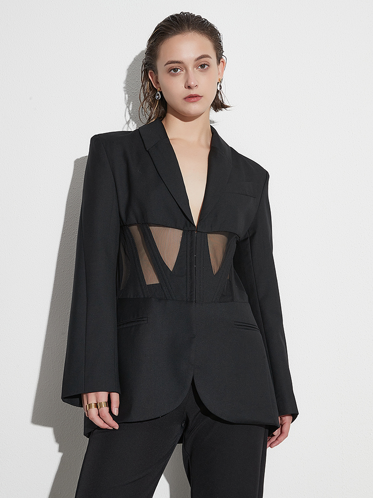 Diseño de chaqueta sexy de malla transparente con retazos