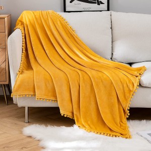 Ультрамягкое флисовое одеяло Роскошное пушистое для дивана или дивана Легкое пушистое теплое постельное одеяло с милыми кисточками из помпонов - Супер уютное для сна Пледы для сна Размер 50 × 60 дюймов Желтый