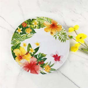 Piatto rotondo in plastica melamina elegante con splendidi fiori tropicali