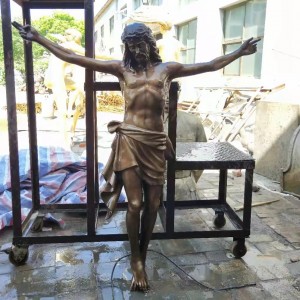 Scultura in bronzu di a crucifixion di Ghjesù