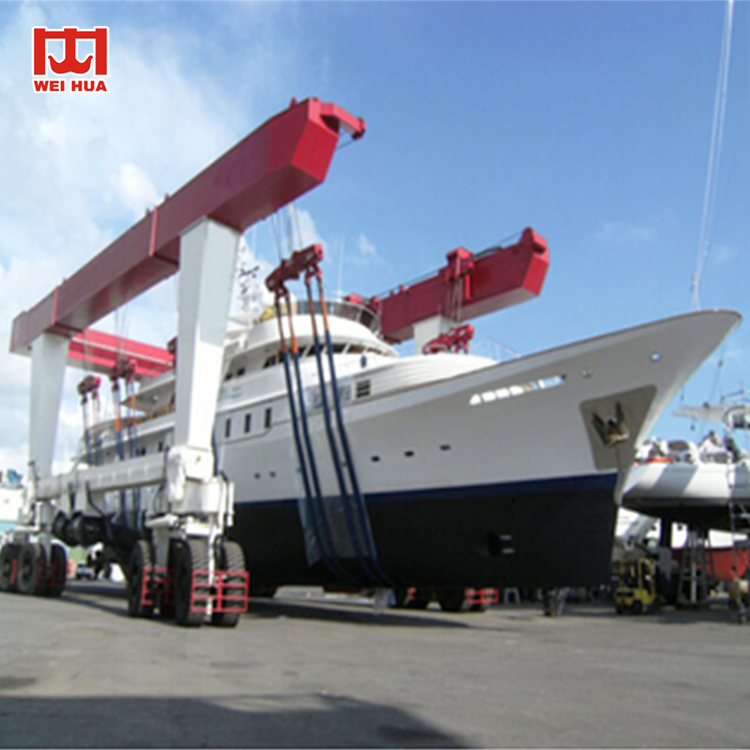 The yacht crane is a rubber tire gantry crane for handling of yacht and boat. It is composed of main structure, traveling wheel group, hoisting mechanism, steering mechanism, hydraulic transmission system and electric control system. The gantry crane has a N type structure, which allows boat/yacht height surpass crane’s height.