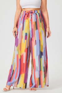 Szerokie spodnie damskie w swobodnym, luźnym, czeskim, kolorowym wzorze