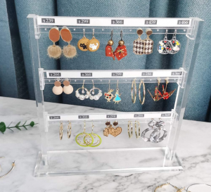 Espositore di gioielli trasparenti persunalizati Supportu per l'orecchini in acrilico per a decorazione di u magazinu per e donne