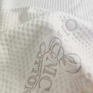 Tessuto per materasso jacquard lavorato a maglia in cotone organico riciclato naturale