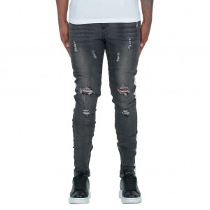 Jeans di moda d'alta qualità per l'omi pantaloni in denim slim à strisce bianche scure in jeans strappati