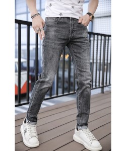 Nuevos pantalones vaqueros grises de los hombres de la estación europea marca de moda productos europeos tendencia pantalones de pie pequeño de estiramiento medio delgados
