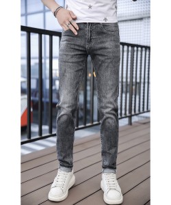 Nuevos pantalones vaqueros grises de los hombres de la estación europea marca de moda productos europeos tendencia pantalones de pie pequeño de estiramiento medio delgados