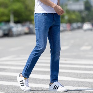 Džinsi vīriešiem Honkongas jauniešu daudzpusīgas mazas pēdas vīriešu bikses plānas pavasara modes zīmols
