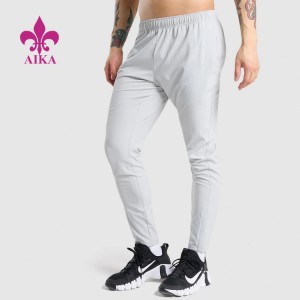 Lowest Price for Shorts For Sports Fitness - OEM Four Way Stretch Quick Dry ligthweight Elastic Waist Nylon Track Gym Jogger Pants For Men – AIKA