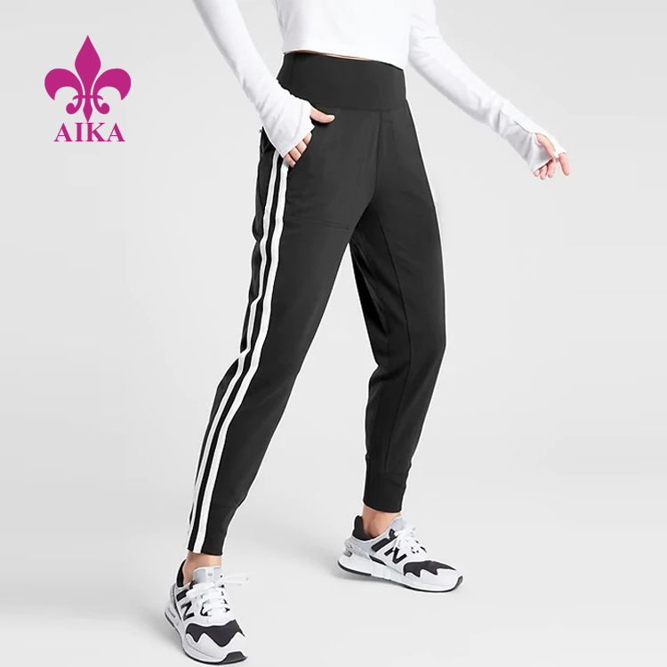 2021 China New Design Women Sportswear - Ladies Sports Wear Lightweight Breathable Zip Pocket Side Stripe Jogger Running Pants – AIKA