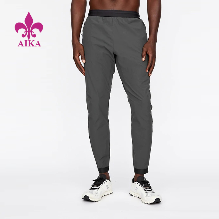 Leading Manufacturer for Running Wear - New Sporty Casual Design Wrinkle-free Lightweight Running Gym Pants Men Sweat Pants – AIKA