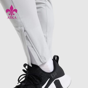 OEM Four Way Stretch Quick Dry ligthweight Elastic Waist Nylon Track Gym Jogger Pants For Men