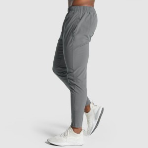 High Quality Four Way Stretch Drawstring Inside Slim Fit Nylon Jogger Pants For Men