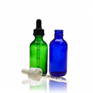 Frosted green transparent glass dropping bottle of essential oil