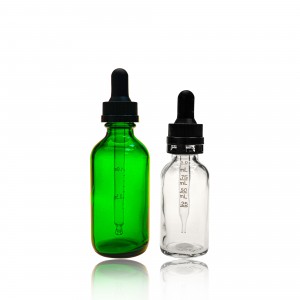 Frosted green transparent glass dropping bottle of essential oil