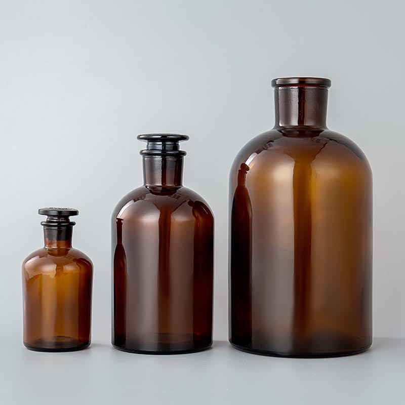 Ampolla de pudí de llet de vidre de preu competitiu fix - 60 ml 120 ml 250 ml Ampolla de reactiu de vidre amb tap rodó ambre - vidre formiga
