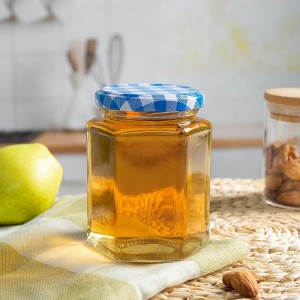 Шкляны слоік для захоўвання мёду аб'ёмам 380 мл з клятчастай вечкам