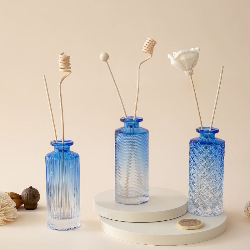 China Modern Blue Ombre Carve Cylinder Glass Reed Diffuser Bottle factory  and manufacturers