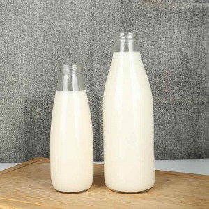 Okrągła przezroczysta szklana butelka na napoje mleczne o pojemności 10 uncji i pojemności 32 uncji