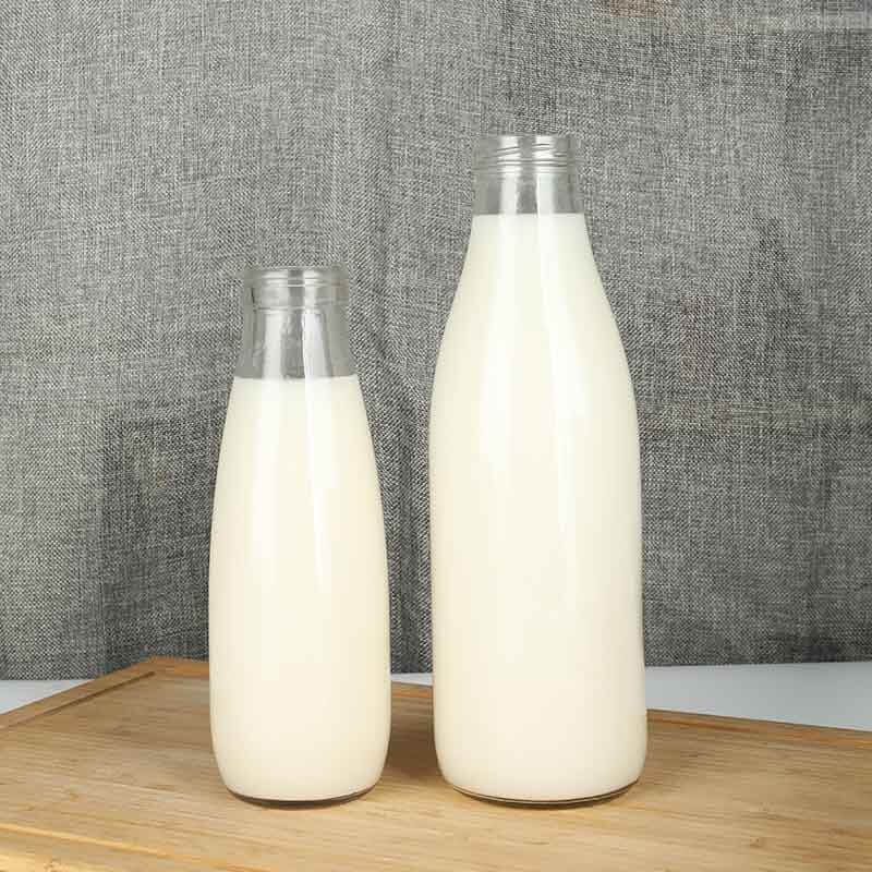 Mejor precio en champú y acondicionador de botella roja - Botella de vidrio redonda transparente para bebidas de leche de 10 oz y 32 oz - Ant Glass