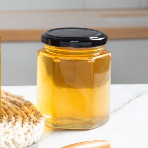180 ml sechseckiger Honigtopf aus Glas mit Lug Cap