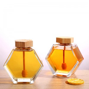 Pot de miel en verre hexagonal avec barre d'agitation en bambou