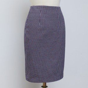 A Plaid Skirt Covering The Buttocks